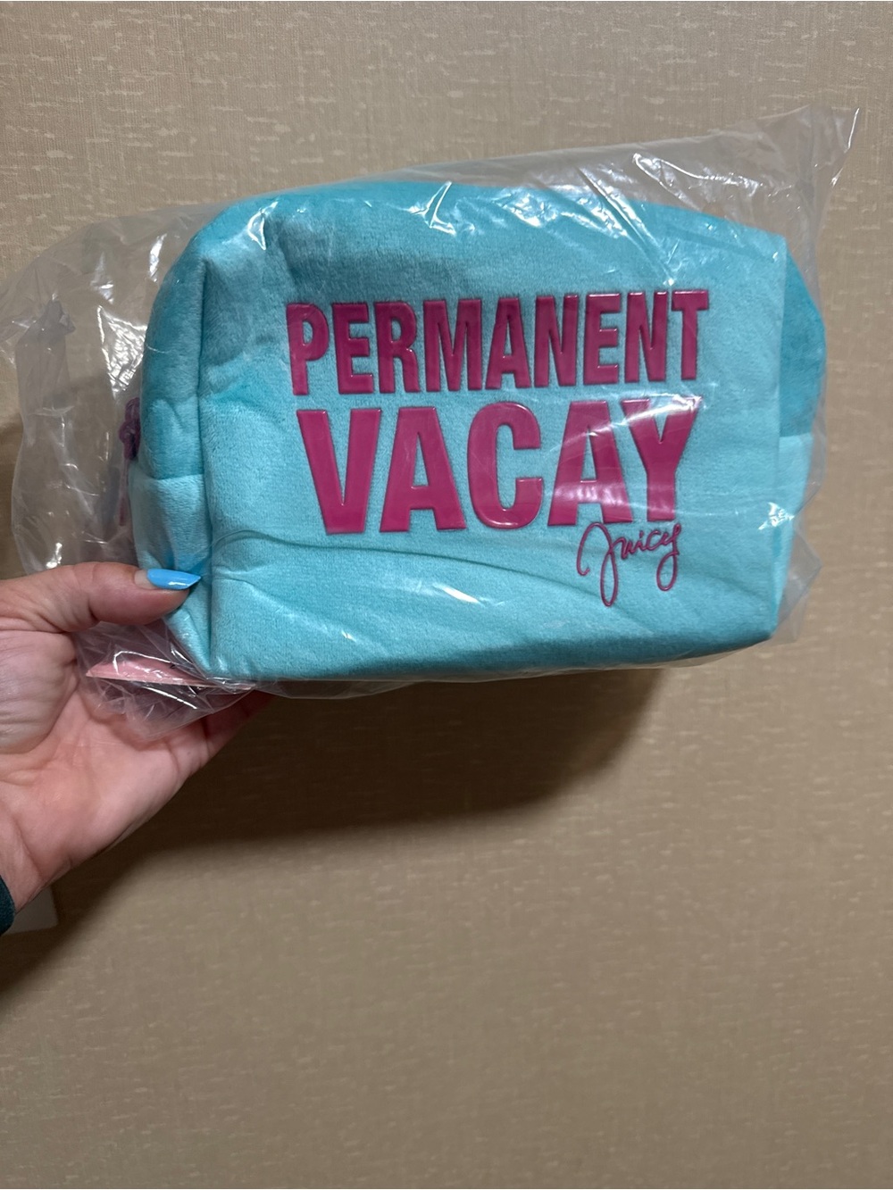 Juicy Couture turquoise cosmetic bag with pink lettering